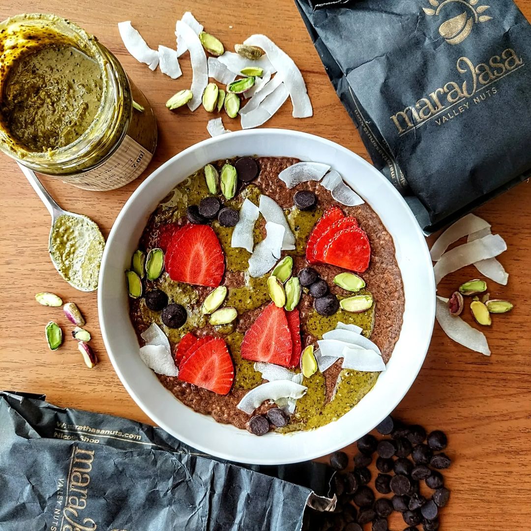 Chocolate chia pudding topped with pistachio butter