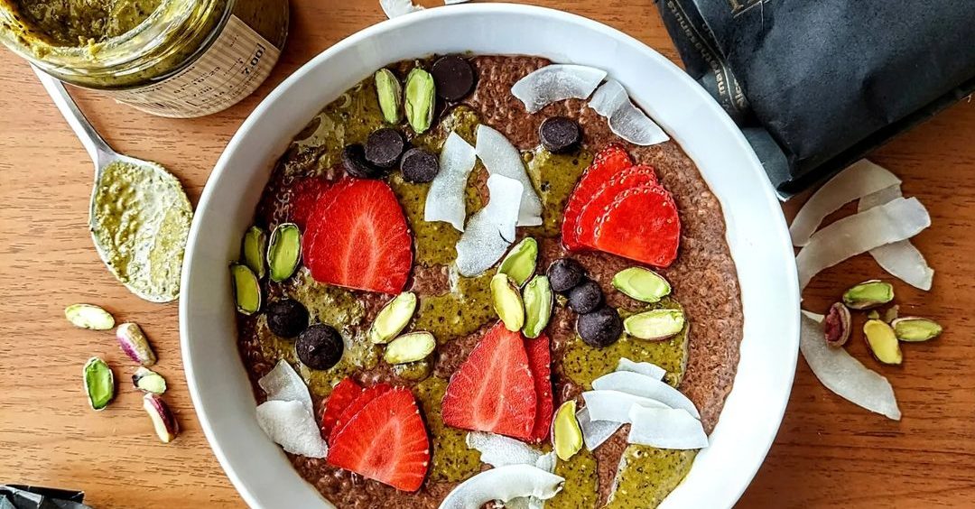Chocolate chia pudding topped with pistachio butter